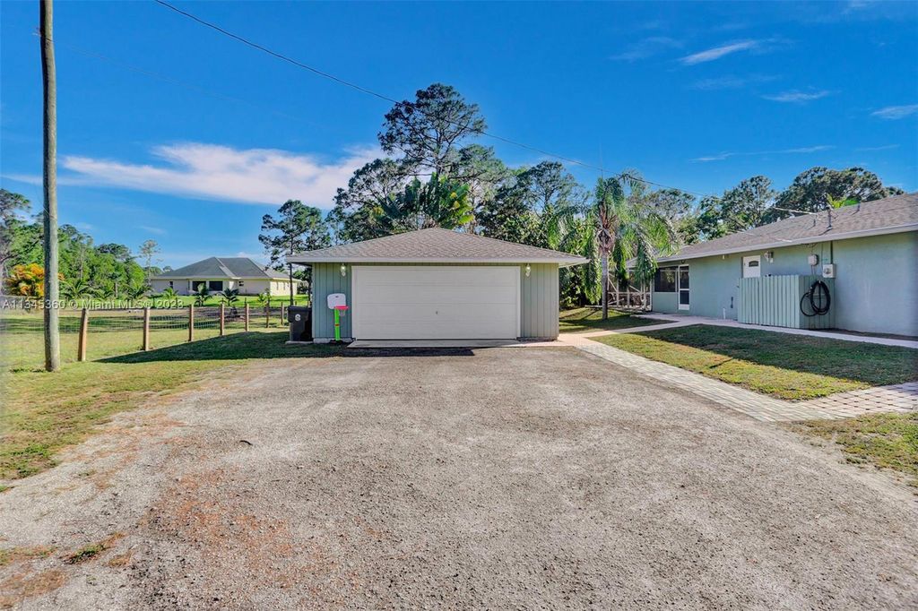 Photo of 14718 N 85th Rd N, Loxahatchee, FL 33470 (MLS # A11345360)