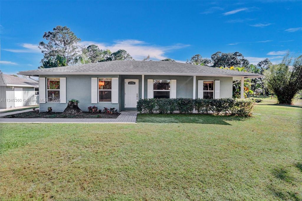 Photo of 14718 N 85th Rd N, Loxahatchee, FL 33470 (MLS # A11345360)