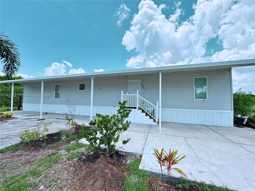 Check out this 2022 manufactured home on 10 fully fenced acres in Lorida, FL. Move-in ready with modern updates, security system, outdoor kitchen, and pool. This sale includes RV, lofted barn-cabin, side-by-side ATV, shed/garage, chicken coop, animal pens, 2019 excavator, 2024 mower. Fruit trees such as guava, mango, lemon, and orange. Livestock included: 12 pigs, 20 goats, 30 chickens, and 3 cows. This property is zoned AG with plenty of space for expansion, gardening, or additional dwellings. With quick access to Lake Istokpoga, Sebring, and local amenities, this property delivers value whether you're looking for a full-time residence, seasonal escape, or investment in land and livestock. Don’t miss your chance to step into a complete homestead with all the essentials already in place.