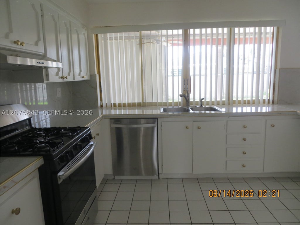 Photo of 8570 Sunset Strip #8570, Sunrise, FL 33322 (MLS # A12075843)