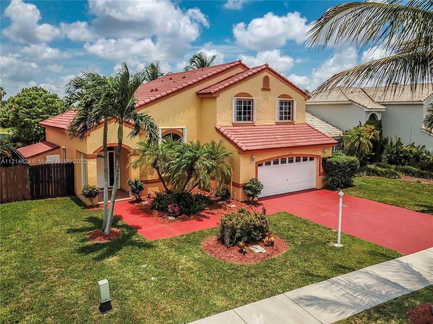 Beautiful lakefront home full of natural light and lake views throughout. This 4 bed / 3 bath home features a master bedroom upstairs with a stunning lake view. His and hers walk-in closet and oversized bathroom with shower and jacuzzi. Bedroom on ground floor features a full bathroom, great as an in-law quarters or guest bedroom. Kitchen was completely renovated in 2021. Brand new Rheem A/C units .Large backyard with astounding lake views, extended covered terrace, fruit trees (1 lychee & 4 mango) and plenty of space for pool. Property also features a full home generator, gas water heater and CBS block shed. Priced to sell! Don't miss out on this opportunity!