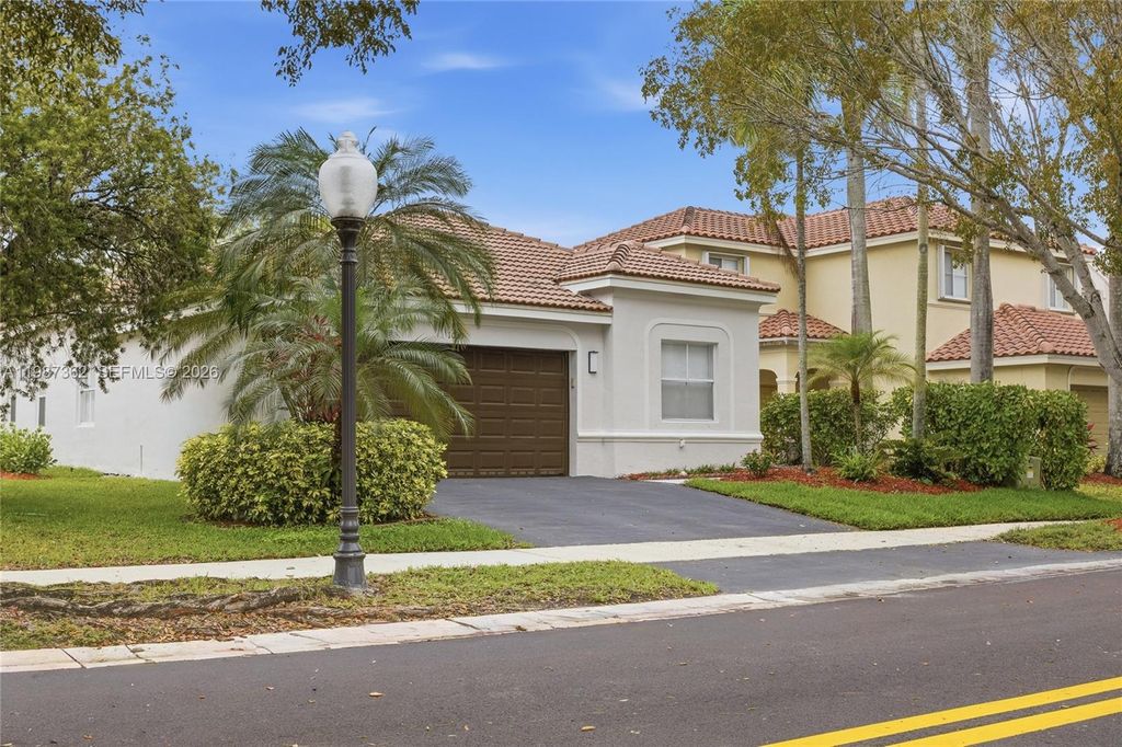 Photo of 1039 Bluewood Ter #1039, Weston, FL 33327 (MLS # A11987362)