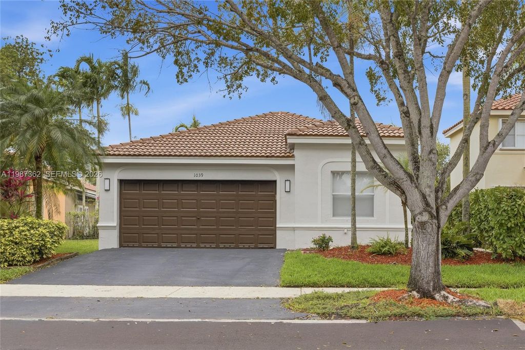 Photo of 1039 Bluewood Ter #1039, Weston, FL 33327 (MLS # A11987362)
