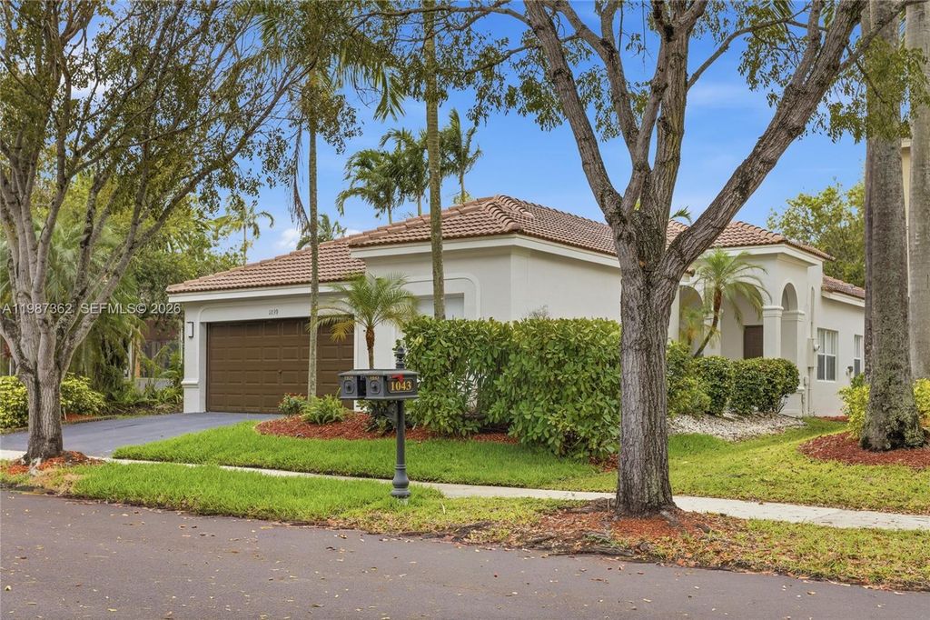 Photo of 1039 Bluewood Ter #1039, Weston, FL 33327 (MLS # A11987362)