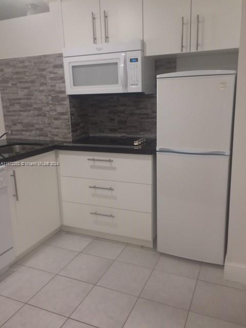 FOUR AMBASSADOR CONDO - Residential Lease