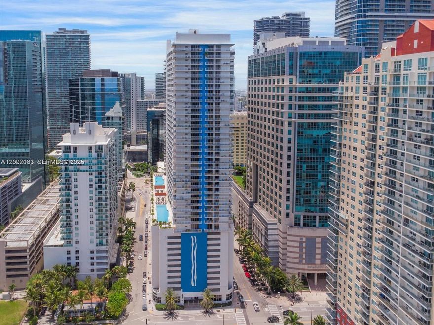Welcome to your stylish sky residence at The Club at Brickell Bay—located in the heart of Brickell, Miami’s premier destination for luxury living, business, and vibrant city energy. This fully remodeled 1-bedroom, 1-bathroom residence offers the perfect blend of modern elegance and comfort, ideal as a primary home, second residence, or high-performing investment property. Perched in a sleek waterfront high-rise, this unit features breathtaking ocean and skyline views from a spacious private balcony—perfect for enjoying both sunrise and sunset. The thoughtfully designed floor plan includes upscale finishes, and two built-in walk-in closets. Curated furnishings and contemporary décor create a sophisticated, move-in-ready experience. Residents enjoy resort-style amenities including 24-hour concierge and valet, two swimming pools, jacuzzi, state-of-the-art fitness center, sauna, game room, social lounge, kids’ room, and BBQ area. Just steps from Brickell City Centre, world-class dining, shopping, and nightlife, and minutes from Miami Beach and MIA Airport. Low HOA includes ultra-high-speed internet, HD cable, and water. With NO SHORT TERM RENTAL RESTRICTIONS, this Airbnb-friendly property offers exceptional income potential and strong ROI. A rare opportunity in one of Miami’s most desirable buildings. Next to up and coming Ken Griffin Citadel Headquarters .