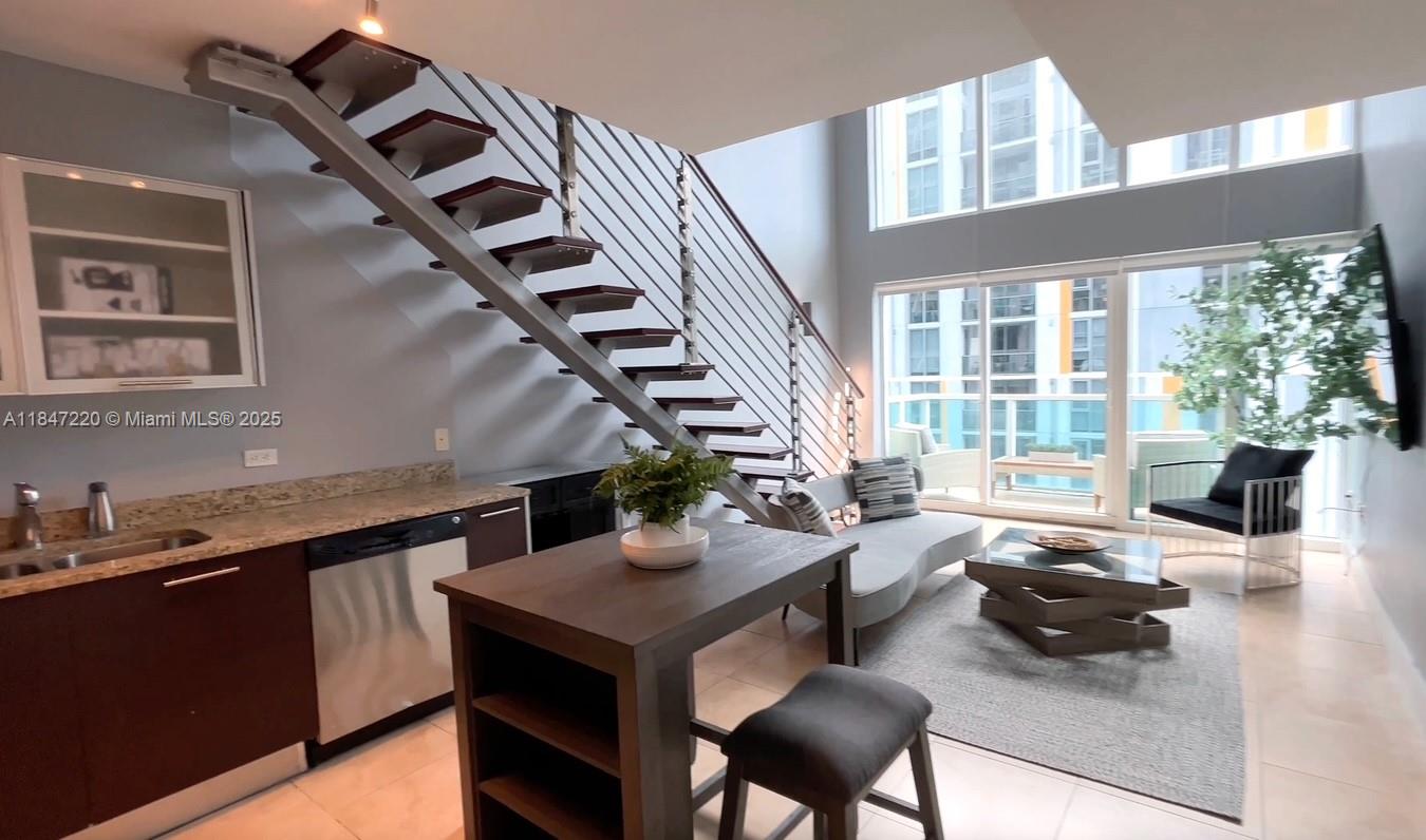 Fully Furnished Bi-Level Loft in Brickell on the River South! Great for investors.
Spacious 1BD/1.5BA loft-style condo with 1,056 sq ft, double-height ceilings, and floor-to-ceiling impact windows offering city and river views. Modern open kitchen with granite countertops, stainless steel appliances, and European cabinetry. Upstairs primary suite includes walk-in closet and spa-style bath with dual vanity, jacuzzi tub, and shower. Washer/dryer in-unit. One assigned parking space included.
Full-service building with 24-hr concierge, 2 pools, 3-story fitness center, spa, business center, and more. Pet-friendly, valet for guests, and no special assessments. Prime location—steps to Brickell City Centre, Metromover, dining, and shops. 30-day minimum rentals allowed.
Bring your offer!