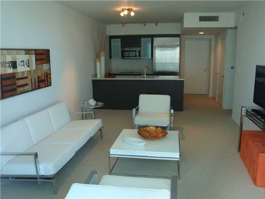 Spacious 1/1 Fully Furnished! Central location. Stainless steel appliances.  Water and City views.  Balcony.  Washer and dryer in unit.  Jacuzzi and shower in Bathroom. Pool, spa, cinema room, gym, 1 parking, valet and much more.