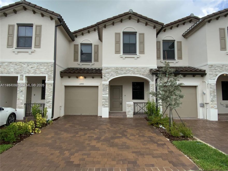 Beautiful townhome in the desirable Corsica community in Homestead. This spacious 3-bedroom, 2.5-bath residence features a modern two-story layout, open living and dining areas, and a private patio perfect for relaxing or entertaining. The home is very well maintained and features luxury vinyl flooring throughout the second floor, adding both style and durability. Enjoy the convenience of a 1-car garage plus additional driveway parking. Excellent location with quick access to the Turnpike, nearby schools, shopping, and everyday conveniences. Located in a family-oriented community, this home offers comfort, style, and convenience in one of Homestead’s growing residential areas.