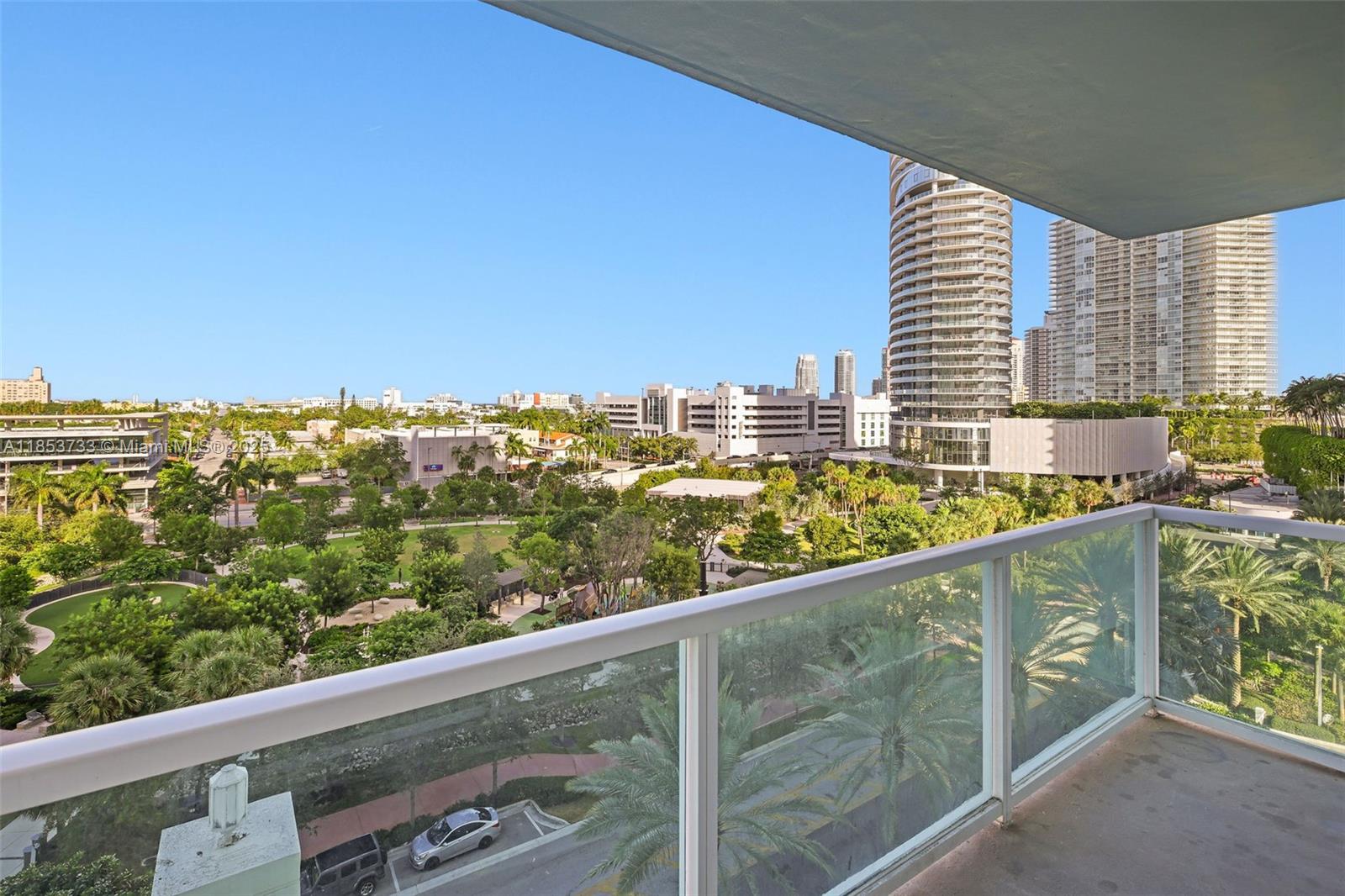 Spacious 2-bedroom + Den residence at 650 West Ave. 1,399 SQFT, with a bright open living and dining area, built-ins, and a balcony with park views and sunrise views, and soon we will have a connection with South of Fifth. Features include a modern kitchen, upgraded bathrooms, full-size washer and dryer, walk-in closet, and in-suite bath in the primary. Two assigned, covered parking included. Bayfront, full-service building with 2 pools, hot tub, fully equipped gym, on-site market, and 24-hour concierge and security.