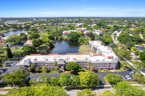 Photo of 2850 Forest Hills Blvd #114, Coral Springs, FL 33065 (MLS # A11854392)