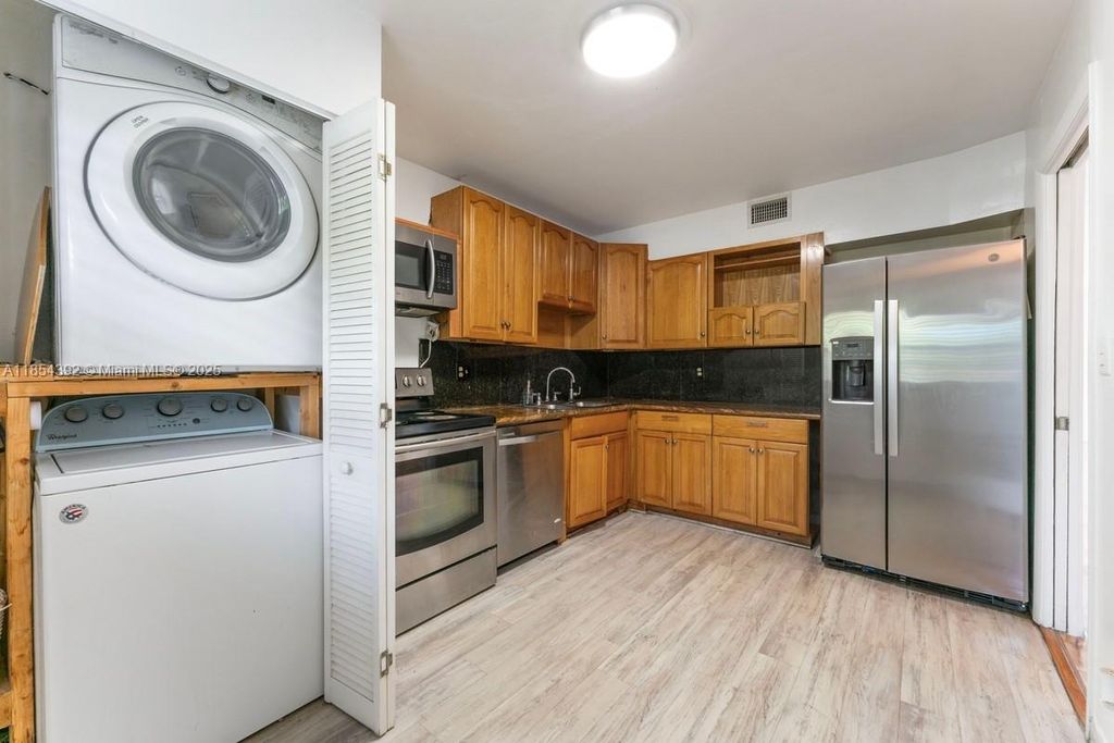 Photo of 2850 Forest Hills Blvd #114, Coral Springs, FL 33065 (MLS # A11854392)