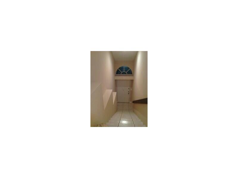 Beautiful Apt. Tiled, Well maintained, Balcony looking over the Canal. Gated and Guard community, Quiet Neighborhood, Tennis and Racket Ball Courts, Swimming Pools and a Gym
