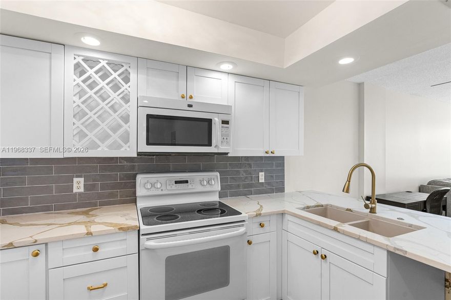 Spacious and beautifully updated 2 bedroom, 2 bath corner condo in the sought-after Royal Park community of Oakland Park. This bright residence offers an expansive living and dining area, elegant laminate wood flooring, and a remodeled kitchen and bathrooms. Relax on the screened balcony with peaceful, private views of lush greenery and the tranquil canal — the perfect spot to start your day. Royal Park offers exceptional amenities including 3 heated pools, a clubhouse with men’s and women’s gyms, library, game room and auditorium, BBQ areas, picnic tables, car wash area, bike storage, multiple laundry facilities, sauna, 24-hour guard gate, and is PET FRIENDLY. Ideally located minutes from shopping, dining, and entertainment with easy access to Wilton Manors, Downtown Fort Lauderdale, and I-95. Outdoor enthusiasts will love the nearby playground, sand volleyball, basketball, tennis and pickleball courts, Stunson Nature Trail, Easterlin Park, and Bark Park. HOA includes water, cable TV, and internet. A wonderful place to call​​‌​​​​‌​‌​​​‌‌​​​‌‌‌​​‌​​‌‌​​​​ home!