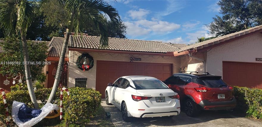 Beautiful and spacious 2 bedroom, 2.5 bathroom tri-level townhome with a 2-car garage, located in the desirable Inverrary community. The roof was replaced last year and is paid in full, offering peace of mind for the next owner. Enjoy a large private outdoor patio, perfect for relaxing or entertaining.
This home features a flex space/den that can easily be converted into a third bedroom, adding excellent value and versatility. The owner has also added a climate-controlled room in the garage, ideal for a home office, guest space, or hobby room.
Set within a gated community spanning over 50 acres of beautifully maintained landscaping, residents enjoy resort-style amenities including three heated swimming pools, 24-hour guard-gated security, and well-maintained common areas. Association maintenance includes roof repairs, exterior maintenance, lawn care, and hedge trimming.
Association requires a minimum 725 credit score. Conveniently located near shopping, dining, and major highways. A must-see opportunity combining space, flexibility, and community living.