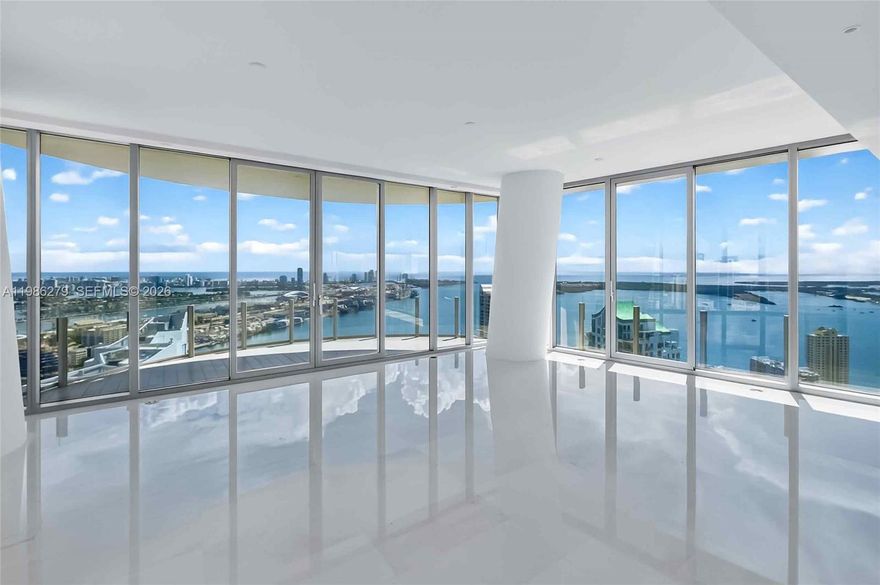 Exceptionally rare and offered unfurnished, this spectacular 4-bedroom, 5-bathroom plus powder room residence at the iconic Aston Martin Residences Miami delivers a truly unmatched waterfront lifestyle. Showcasing breathtaking 180-degree unobstructed views of Biscayne Bay and the Miami skyline, this exquisite home features a private elevator lobby, two assigned parking spaces, an expansive floor plan, and top-of-the-line finishes throughout.
Designed for both sophisticated entertaining and everyday comfort, the grand living spaces flow seamlessly while each bedroom offers the privacy and ambiance of a personal retreat. Residents enjoy access to an extraordinary collection of world-class amenities, including a private marina, a state-of-the-art two-level fitness and wellness center, and an exclusive Sky Deck on the 52nd floor featuring a spa, swimming pool, and full-service concierge.
Set in one of Miami’s most prestigious residential towers, and just moments from the city’s finest dining, nightlife, and entertainment, this residence represents the pinnacle of contemporary luxury living.