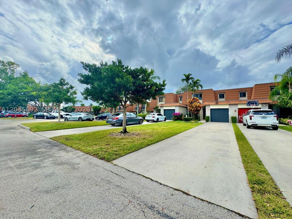 Photo of 1415 SW 110th Way #1415, Davie, FL 33324 (MLS # A12035692)
