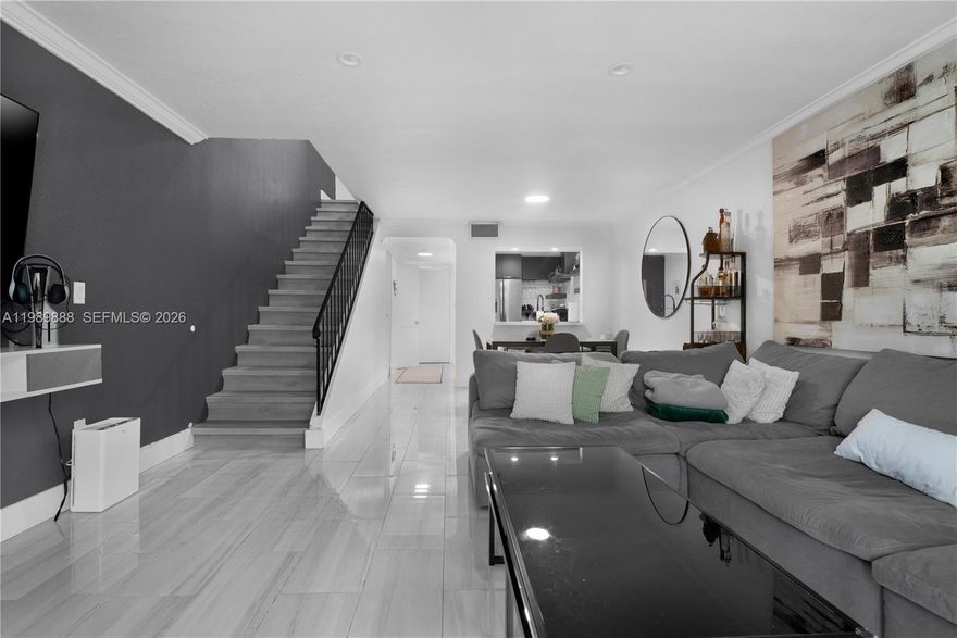 Welcome to Puerta Del Sol! This updated two-story condo features a brand-new kitchen with quartz counters and subway tile backsplash, plus hurricane impact windows & doors throughout. The main level offers ceramic tile floors, while upstairs boasts modern LVP flooring. Enjoy 1.5 baths, in-unit washer & dryer, and two private balconies for outdoor living. The community provides convenience with one assigned parking space plus visitor decal and water included in the HOA. A perfect blend of comfort and style in a desirable location!