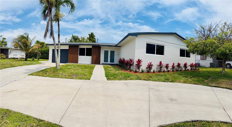 Step into this enchanting, fully remodeled home in the heart of Cutler Bay, where modern elegance meets comfort and style. This beautiful residence offers 3 spacious bedrooms and 2 tastefully updated bathrooms, designed with a bright and open layout perfect for both everyday living and entertaining. The home showcases high-end upgrades throughout, including impact windows and doors, brand-new flooring, and a stunning modern electric fireplace that creates a warm and sophisticated focal point in the living area. A custom mini bar with a built-in wine cooler adds a touch of luxury—ideal for hosting and relaxing. The contemporary kitchen features sleek granite countertops, stainless steel appliances, and ample cabinetry, blending functionality with refined design. Step outside to a screened-in porch with mosquito enclosure, perfect for enjoying Florida evenings year-round. The expansive backyard offers endless possibilities, with plenty of space to design your dream pool and outdoor oasis. Additional highlights include a circular driveway, a one-car garage, and lush, lavish landscaping that enhances the home’s curb appeal and creates a serene, welcoming atmosphere. This move-in ready gem is truly captivating—an exceptional opportunity to own a turnkey home in a desirable location near schools, shopping, and major highways.