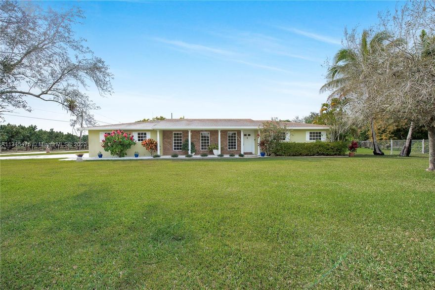 Make this house your home! Well kept 4-bedroom, 2-bathroom, 1.5 car garage on a 31,329 sq. ft corner lot in the desirable Redlands area! Large circular drive way. The trees featured in the yard are avocado mango, lychee, cherry Barbados ,grapes, papaya, mac nut, bay rum tree, Miracle fruit, oak trees and palms. Completed fenced yard w/shed. Plenty of space to park your boat, RV, etc.. This property also features a sun room & screened in patio, great for entertaining. Roof was replaced in 2019. 45 Min drive to The Florida Keys!