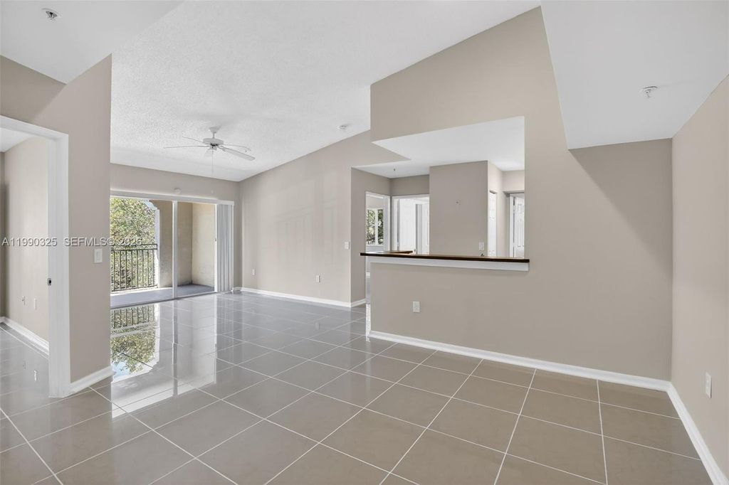 Photo of 2496 Centergate Dr #301, Miramar, FL 33025 (MLS # A11990325)