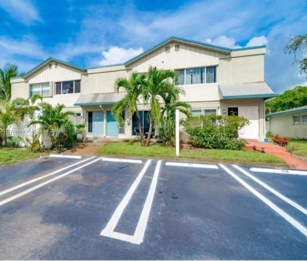 Photo of 3000 NW 5th Ter #111, Pompano Beach, FL 33064 (MLS # A11776565)