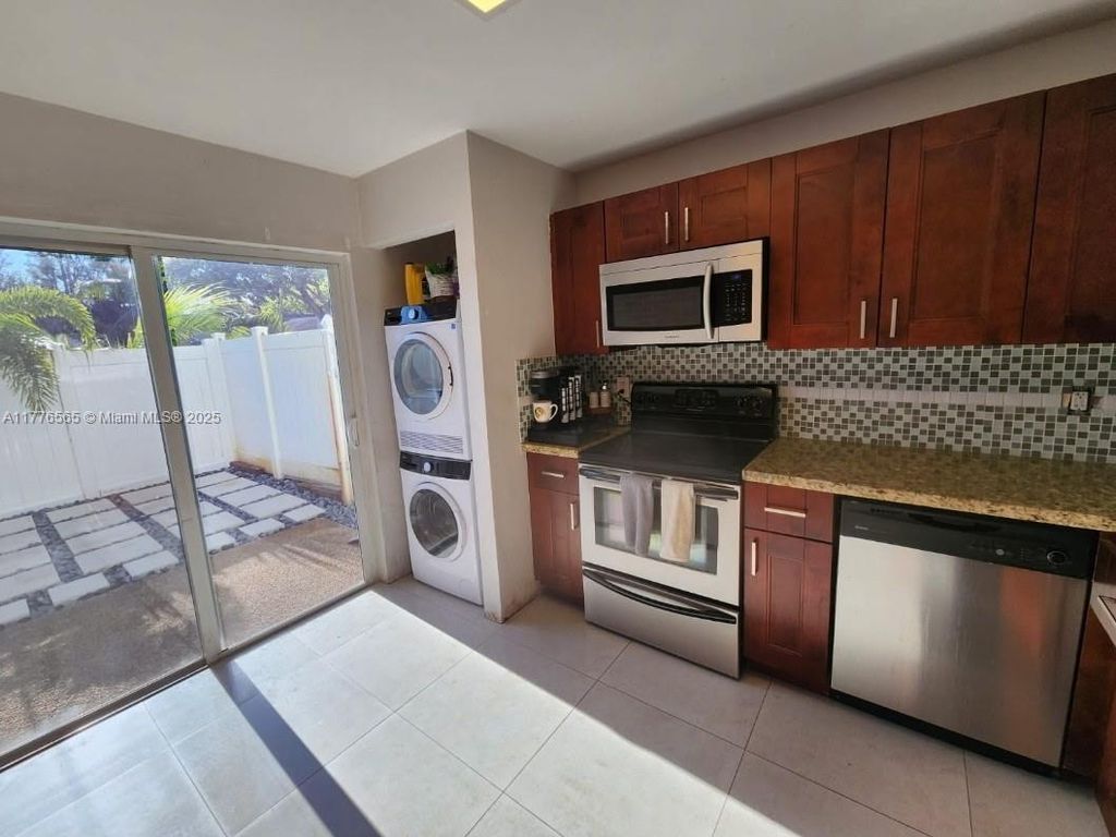 Photo of 3000 NW 5th Ter #111, Pompano Beach, FL 33064 (MLS # A11776565)