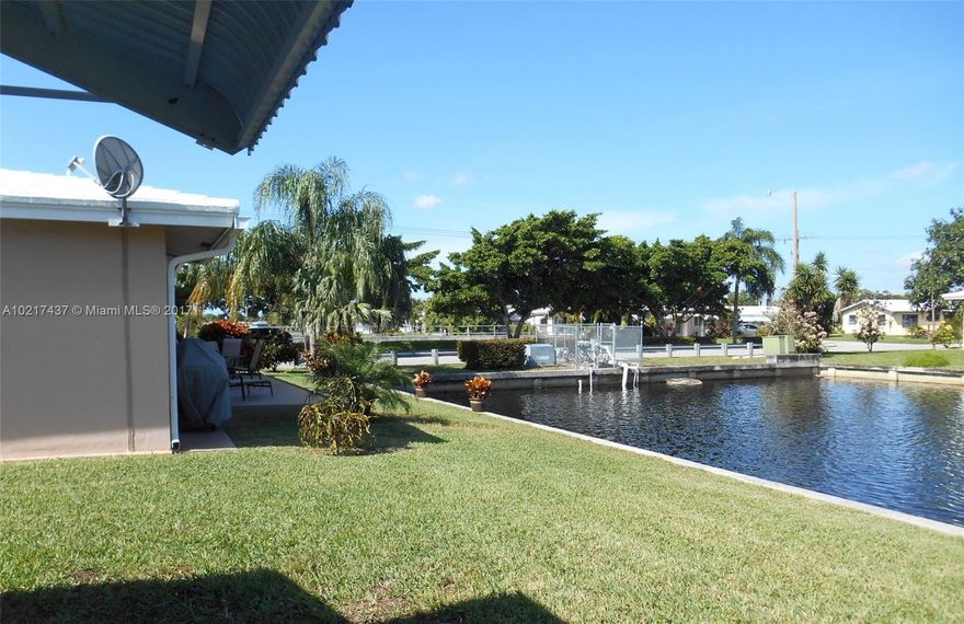 Back on  the market- buyer-must have 700+ credit score for HOA approval. No leasing for first two years. Move-In condition! Beautiful Canal views and water fountain.  2 bdrm, 1 bath + Florida room, patio area + garage. Updated with newer kitchen and appliances, updated bath and electric.  Exterior/Interior freshly painted, Low HOA dues of $80/mo includes lawn care (mowing, sprinkler system, fertilizing). Requires HOA approval,  no leasing first year.  Active, Friendly, over 55+ community with club house, pool, exercise area, monthly dinner dances, game nights, happy hour, and more. NO LOW BALL OFFERS! Appraised for $155,000.