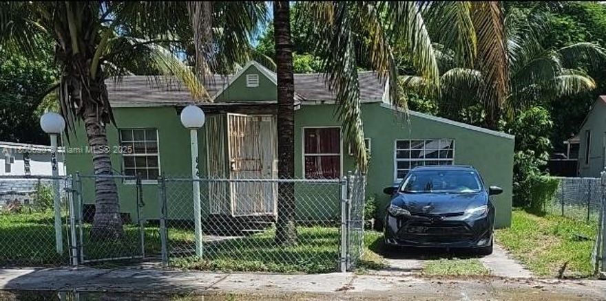 Make this home the best on the block with a renovation loan.   Located in the heart of Miami, this house sits on a spacious lot, providing ample outdoor space for relaxation or potential expansion, reflecting the area's steady appreciation. Its location in the Pinewood neighborhood offers convenient easy access the I-95 expressway and to local schools, parks, and shopping centers, making it an ideal choice for those seeking a blend of comfort and accessibility. Whether you're a first-time homebuyer or looking for a cozy investment opportunity, this house presents a perfect blend of classic charm and modern convenience. Go see now!