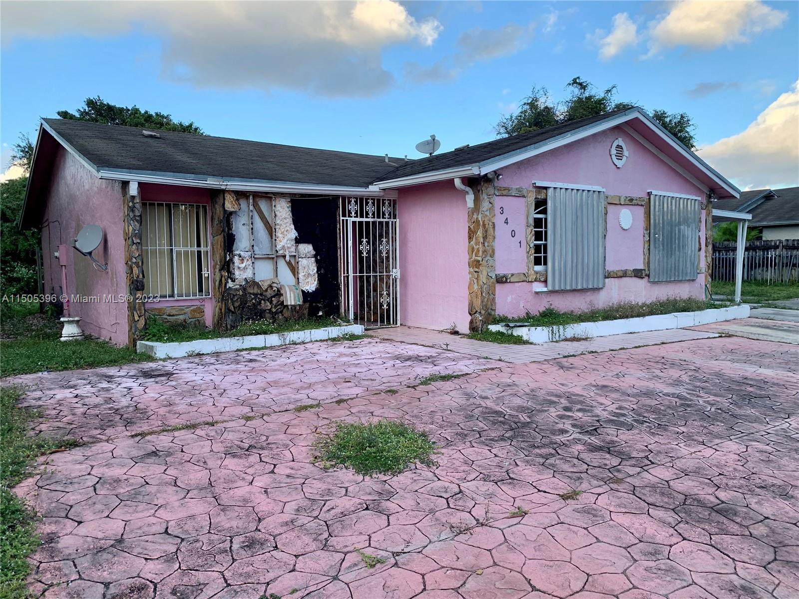 Perfect opportunity for investors and/or homeowner looking to make this home their own in highly desirable neighborhood in Miami Gardens. Property features 3 bedrooms 2 baths and additional room to utilize as an efficiency or additional storage. Plenty of room to add pool. Property needs full rehab. easy to Show, schedule through ShowingTime.