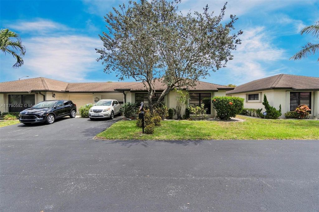 Photo of 4977 Equestrian Cir #B, Boynton Beach, FL 33436 (MLS # A11790592)
