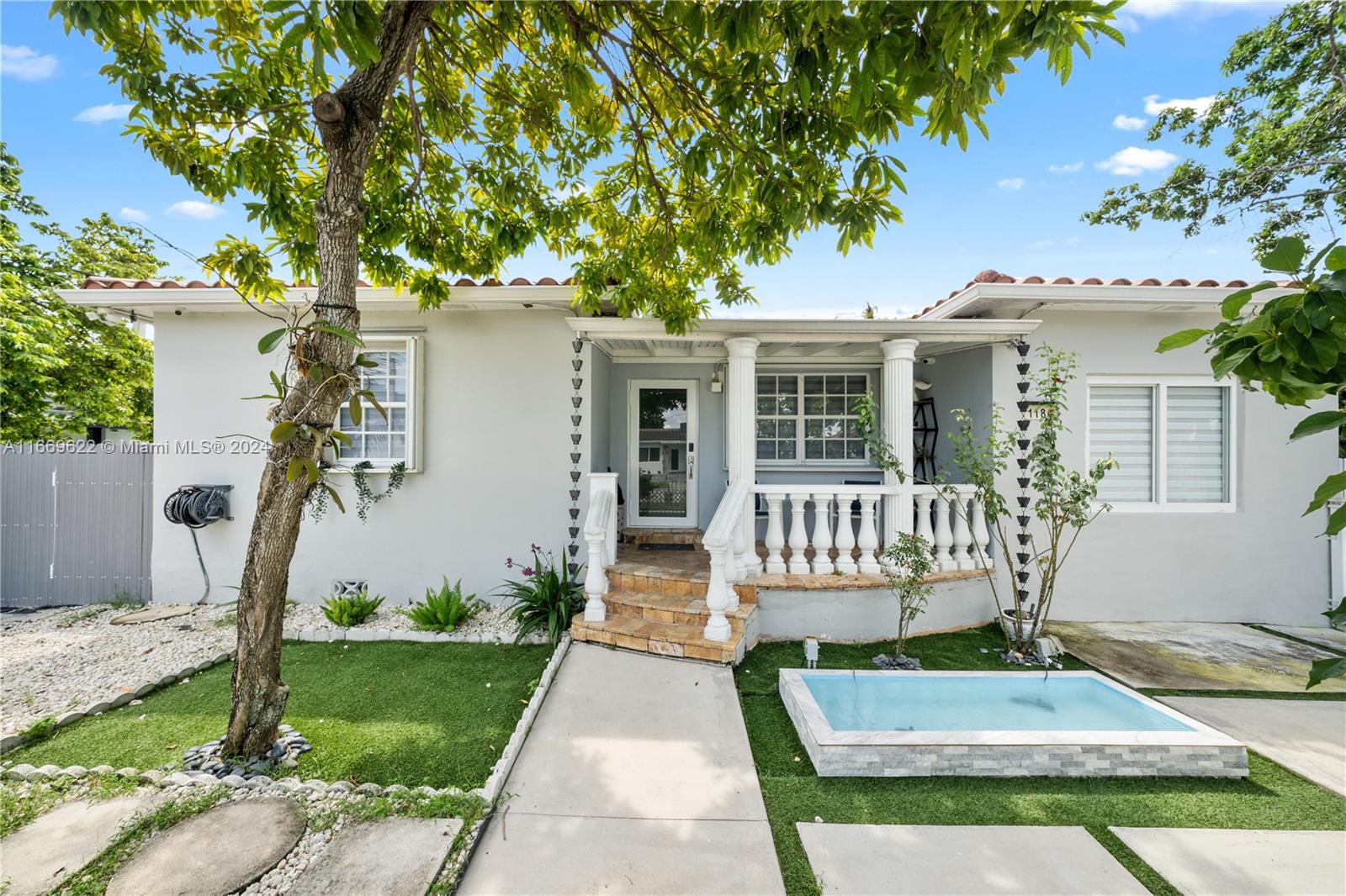 Gorgeous 3 bedrooms 2 baths home that is turn key ready. Marble floors throughout, beautiful kitchen cabinets, quartz countertop, all high quality appliances including Samsung refrigerator with door screen. Impact windows and french doors. Stunning back patio with salt water pool with fairly new pump, grilling area, entertainment area and a space with weight-lifting equipment. Attic is accessible with pull down stairs. The pool deck is paved with travertine pavers and all fenced for maximum privacy. Septic tank drain fill changed in 2020. Paved driveway accommodates 5 vehicles and secured with rolling iron fence. Fruits trees . Property is located 3.6 miles from beach, easily accessible to highways and malls. A must see immaculate home that will not last that is ready for move in.
