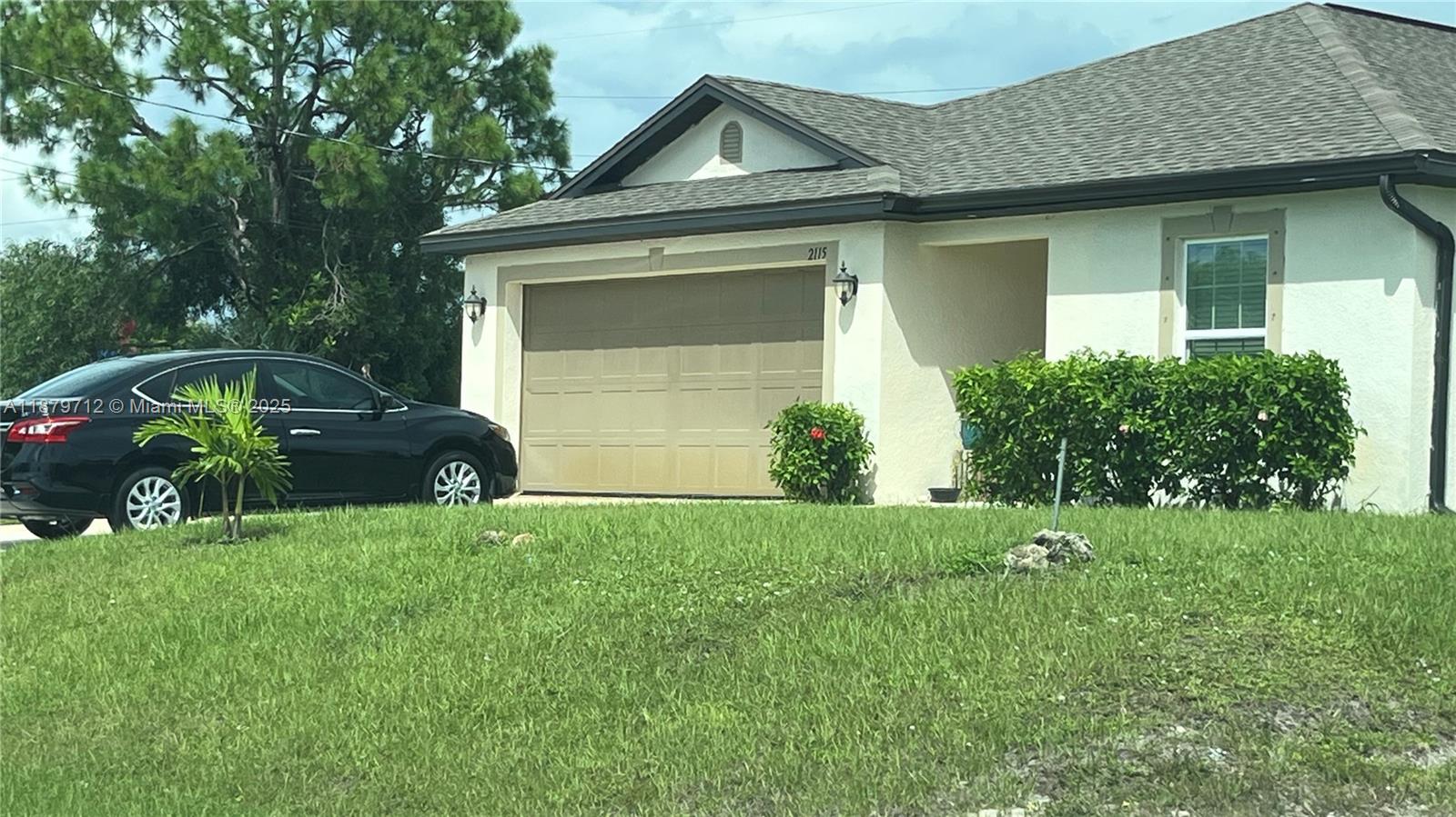 Stunning 2021 property with 2 car garage and its modern features and convenient location in Cape Coral. 10,000 SqFt Lot with beautiful expanse open backyard big enough for pool. Property has been well maintained and has many wonderful features. Washer & Dryer and SS appliances, lovely tile throughout and carpet in bedrooms. The open-concept layout, near new kitchen with kitchen island, and spacious master with large closets in every corner. Plus, the availability of nearby amenities adds to its allure, many stores, great schools and restaurants.
