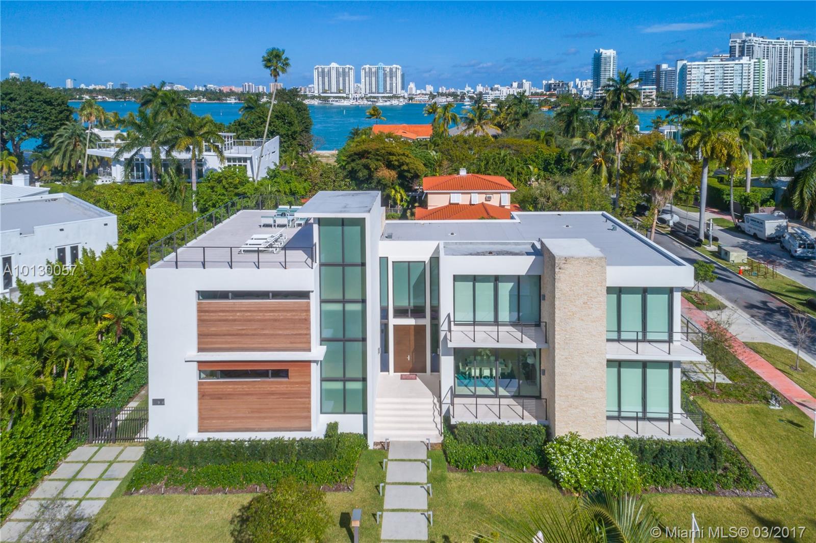 Finished in Dec 2015 by well known Architect Ralph Choeff. This “statement property” is a 5 bedroom, 5 ½ bathroom residence with over 5,000 adjusted interior sq feet. This smart home features Lutron, motorized window treatments, heated pool, Generic Generator & Gas Modern Fireplace. Enjoy the elegant outdoor Cabana (w Kitchen) & heated pool with waterfall feature/outdoor shower. One of a kind, 1000+ sq foot roof deck with Water Bay views. Two car separate garage with covered walkway.