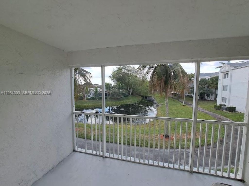 Photo of 5760 Rock Island Rd #327, Tamarac, FL 33319 (MLS # A11964303)