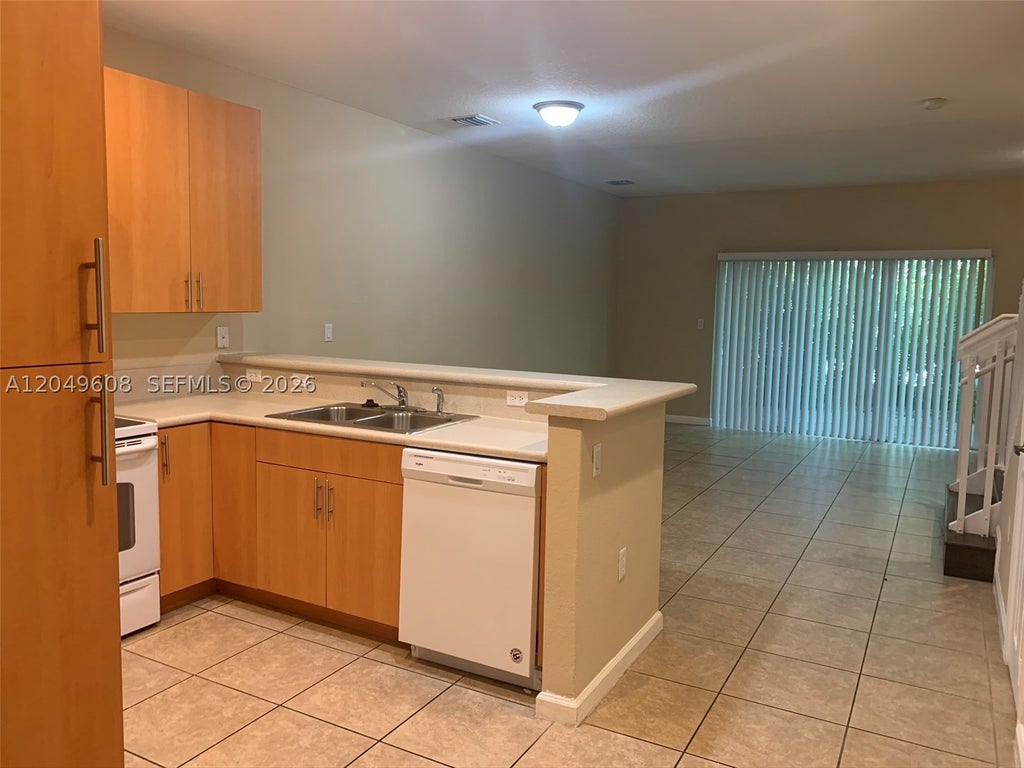 Photo of 3102 NW 24th Way #18, Oakland Park, FL 33309 (MLS # A12049608)