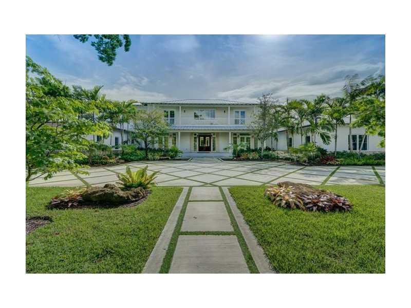 Gorgeous & stately new construction home in Pinecrest. 2 story, 6 bdrm/ 8.5 bath modern plantation estate. Formal dining, living rooms. Soaring ceilings. Professional gas range, top of the line finishes & features. Marble & wood floors. Media & exercise r ooms. Master bdrm upstairs. Elevator ready. Walled and gated, lushly landscaped 36,590 sq ft lot, perfect for entertaining w/ cabana, BBQ area & 25X50 ft pool w/fountain water feature. 4 car garage. Impact/insulated windows. Completion date July 2014.