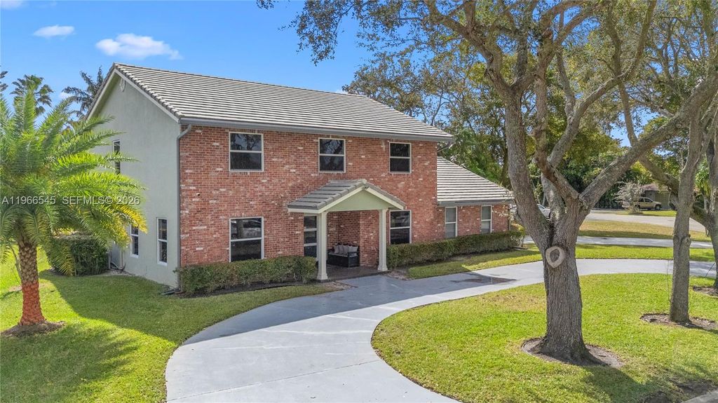 Photo of 11069 Glenwood Dr, Coral Springs, FL 33065 (MLS # A11966545)