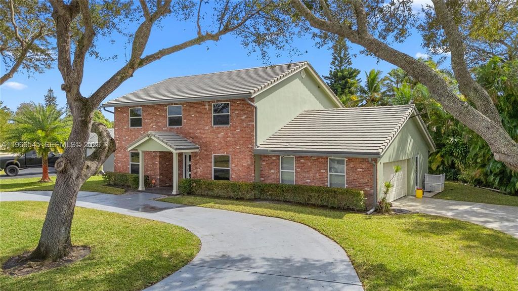 Photo of 11069 Glenwood Dr, Coral Springs, FL 33065 (MLS # A11966545)