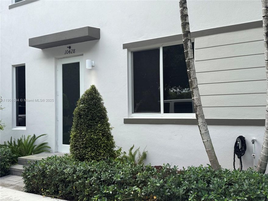 Welcome to this stunning listing at 10428 NW 67 St in the highly coveted Landmark Doral community. This immaculate property boasts 3 bedrooms and 2.5 baths. Located right across from the esteemed Doral International Academy of Math and Science, this property is situated in an unbeatable location. Upon entry, you'll be stunned by the impeccable condition of this home. From the carefully tiled garage to the abundant storage in each closet, every detail has been thoughtfully considered. The backyard has been elegantly upgraded, creating a space perfect for outdoor entertaining or simple relaxation. This property stands apart with incredibly low HOA fees of only $270/month