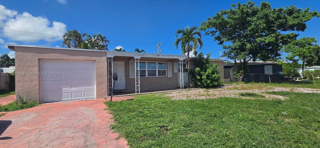 Photo of 601 W Sample Rd, Deerfield Beach, FL 33064 (MLS # A12068954)