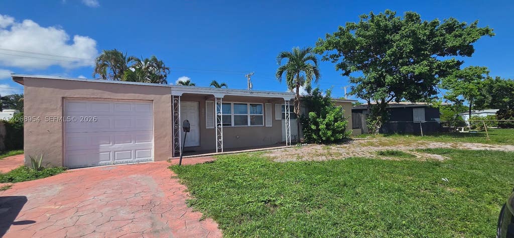 Photo of 601 W Sample Rd, Deerfield Beach, FL 33064 (MLS # A12068954)