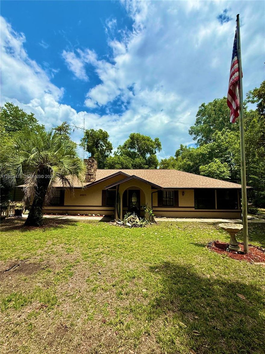 Welcome to your private slice of Florida living on 1.o8 beautiful acres in Belleview. This well-maintained 3-bedroom 2-bathroom home offers the perfect blend of comfort space and functionality. Inside you'll find an updated kitchen designed for everyday living and entertaining alike. Step outside and enjoy the oversized deck - ideal for relaxing evenings family gatherings or weekend BBQ's. Need space for hobbies storage or projects? The large detached garage/workshop gives you endless possibilities. An RV is included with the sale (attached to a deck near workshop) making this property an incredible value for outdoor enthusiasts, travelers , or guests. With room to spread out and enjoy peaceful country-style living while still being conveniently located near town this property is a rare opportunity you won't want to miss.