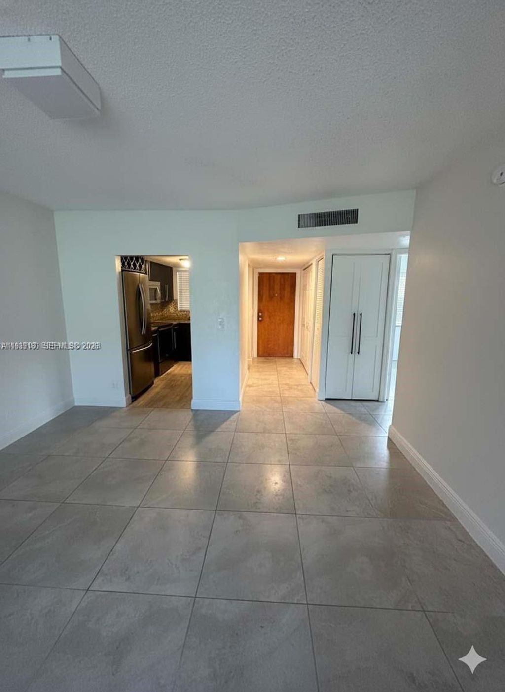 Photo of 1630 Embassy Dr #101, West Palm Beach, FL 33401 (MLS # A11939180)