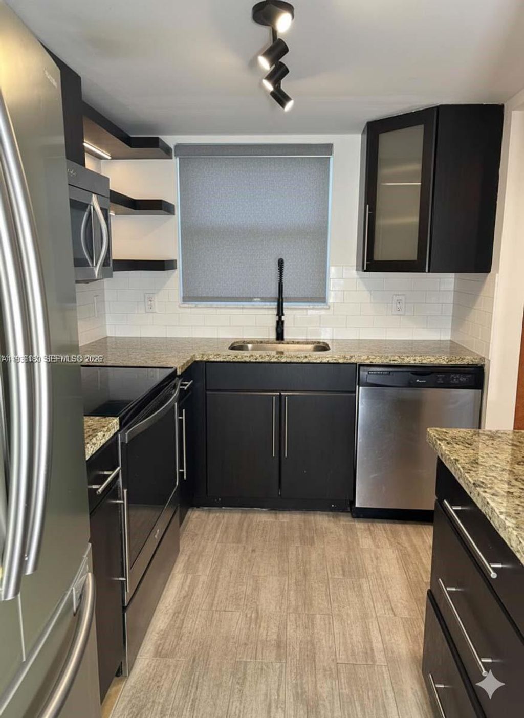 Photo of 1630 Embassy Dr #101, West Palm Beach, FL 33401 (MLS # A11939180)