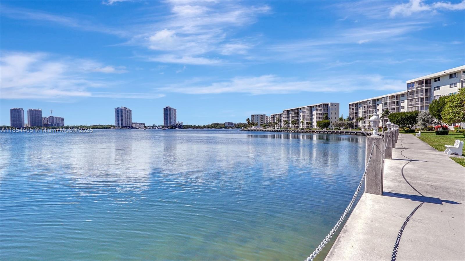 Welcome to a perfect retreat for your second home or retirement with this georgeous corner-unit condo situated in the desirable city of Aventura in a vibrant 55+ gated adult community.This 2Bedroom,2-Bathroom offers relaxing water views from a spacious wrap-around balcony, overlooking a serene open bay.A bright living/dining area, an a welcoming open kitchen w/steenless steel appliaances.Split bedrooms for added privacy, steps to the laundry area.Community is a haven of leisure&convenience, amenities such 5 pools,exercise room,clubhouse,bowling alley,billiard room & courtesy bus.Step outside & you’re just a short stroll to grocery stores,beaches,brighline train station famous Aventura Mall & more.This is more than a home-it’s a lifestyle tailored for relaxation,recreation.Bring your offers