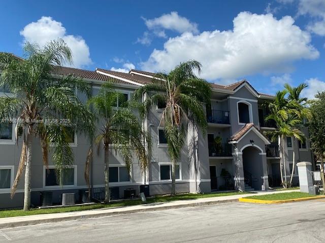 Spacious 2/2 in gated community. Tile throughout, new full-size washer/dryer inside unit. Impact windows with newly installed blinds. Well-maintained community features pool, clubhouse, playground, security patrol.