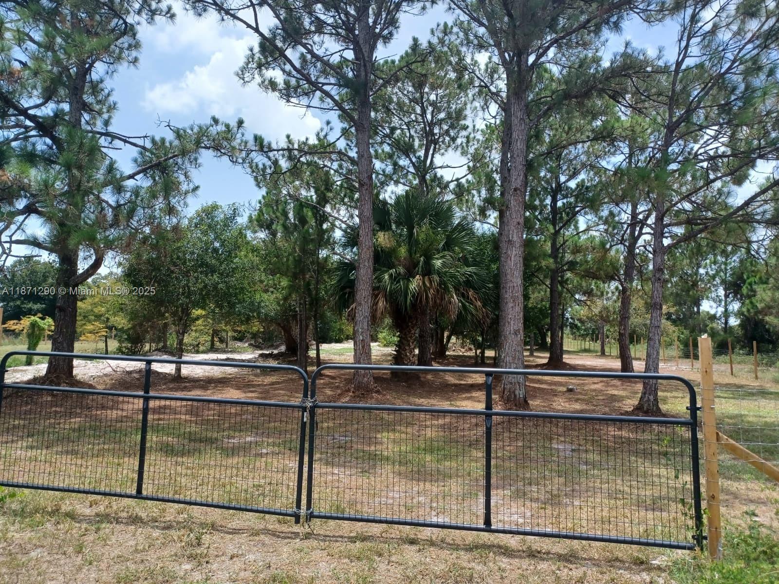 Don’t miss this great opportunity to own a ready-to-build piece of property in Okeechobee! This lot is fully fenced, cleared, and equipped with a well and sewer connection—everything you need to get started right away. The property has been well maintained, making it an excellent investment for residential or recreational use.
