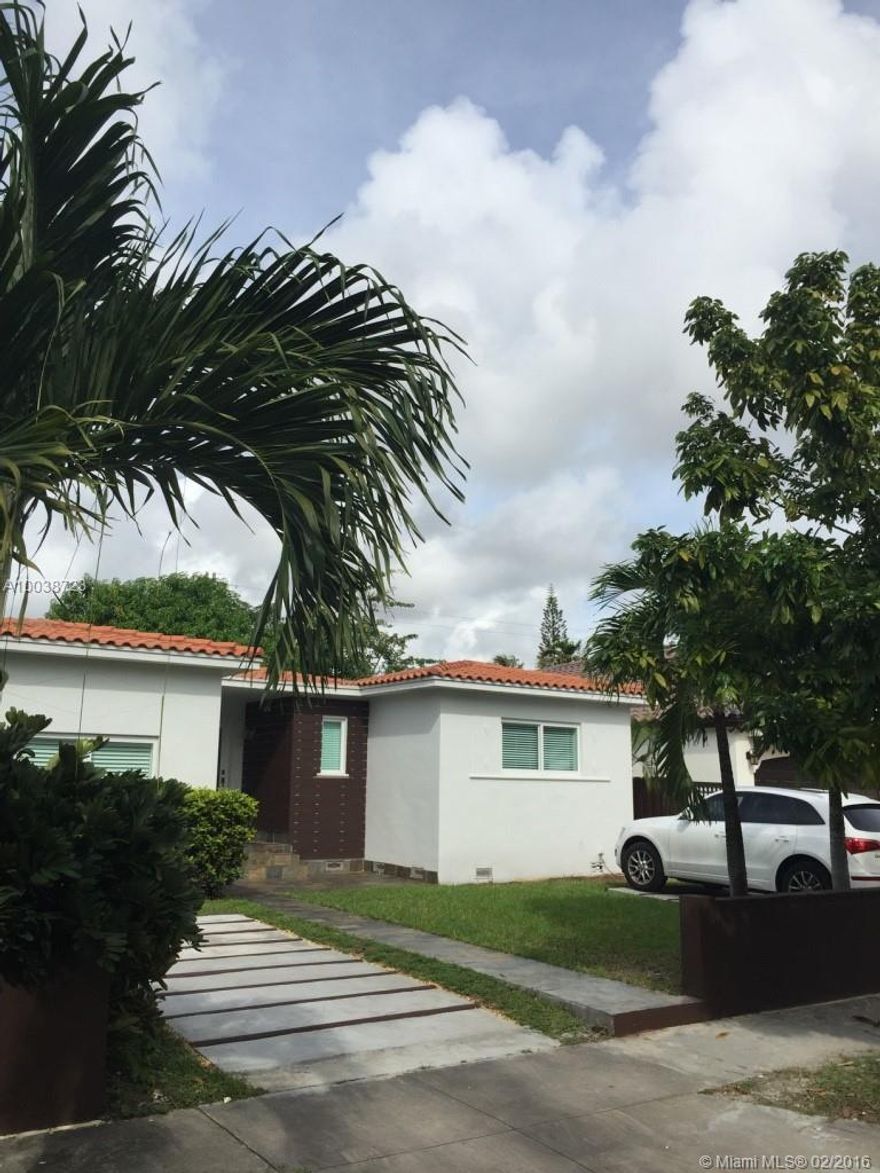 AMAZING LOCATION  FULLY REMOLDED HOME - Home is move in condition with new Impact Windows/Doors, A/C, and tile Roof. Kitchen and bathrooms were fully remolded with quality designs. Beautiful refurbished wood floors through out the living room, hallways, and bedrooms. Dinning area, kitchen and family room new 24x24 tiles. Master bedroom has 2 Walk-in closets with plenty of storage area. House fenced back yard for privacy. Home has 2 separate single car driveways and plenty parking on street lighted curbs.