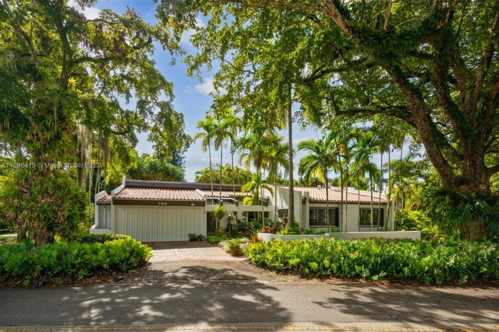 Unique Contemporary 4/3 home on 9,200 sq ft corner lot in North Gables! Designed & Built by well known Gables architect, Amaro Taquechel for his family. This beautiful & spacious home features details such as 15' ceilings flanked by imported solid red wood cedar beams in all entertainment areas, kitchen, Family Room & primary bedroom suite which will delight all buyers looking for modern open spaces overlooking a lush landscaped lot. Make this wonderful home yours today!